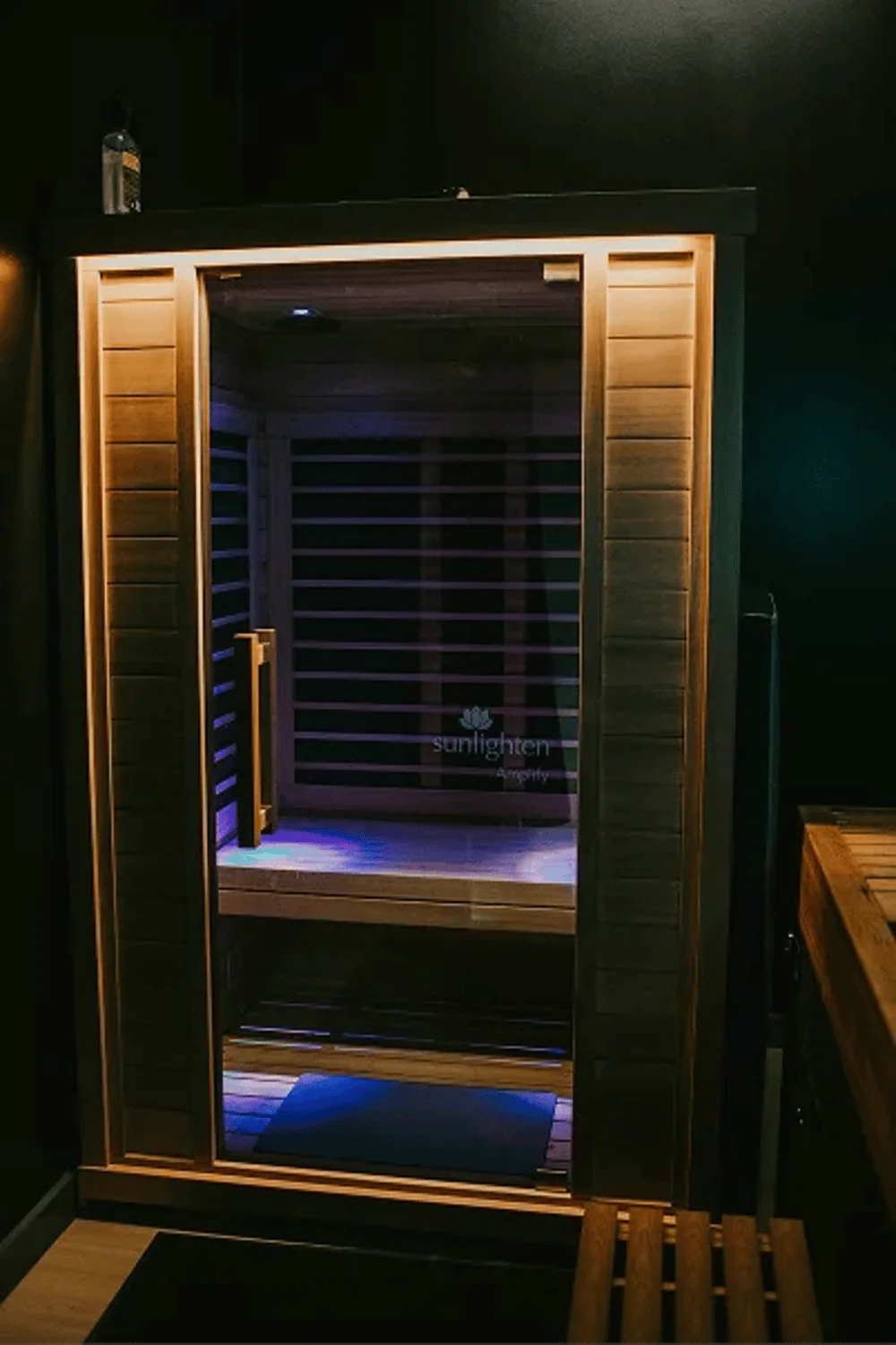 Inside the infrared sauna cabin at the InnerWorks Recovery & Performance Lab