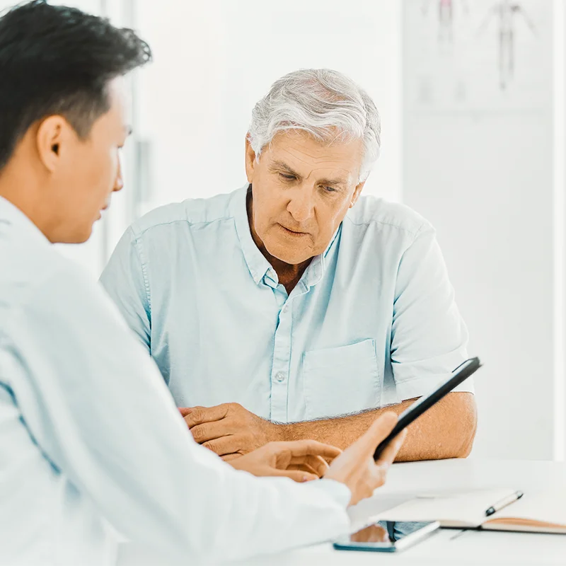 Provider reviewing menopause treatment options with a patient at a St. Augustine clinic